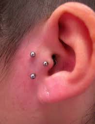 Piercing Vertical Surface Skinwear Tattoo Shop Facial Piercings Tragus Piercings Cool Piercings