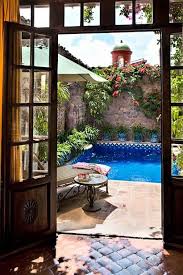 Courtyard spanish hacienda mexican homes colonial patio houses casas plans garten interior garden mediterranean casa courtyards mexico hacienda mexican plans houses homes spanish courtyard floor revival pueblo florida building casitas cracker treesranch front plan older pool visit. 15 Plunge Worthy Pools Spanish Style Homes Hacienda Style Spanish Style