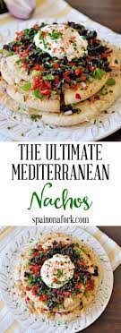 The Ultimate Mediterranean Nachos Recipe Spain On A Fork Recipe Mediterranean Nachos Recipes Nachos Recipe