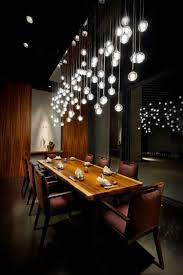 yemek masasi uzeri aydinlatma avize sarkit led cam modeller yemek odasi aydinlatma fikirleri restaurant interior design restaurant interior dining room design