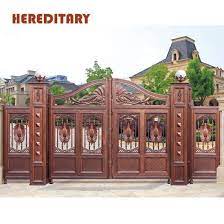 Though iron, wood and metal are popular choices for the gates, it will be a great idea to harmonize it with the architecture of your house. China Outdoor Decorative Latest Main Gate Color Designs For India Homes China Aluminum Garden Gate Sliding Courtyard Gate