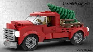 This red pickup truck looks beautiful with a christmas tree. Red Truck With Christmas Tree From Bricklink Studio