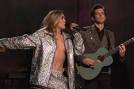 Cyrus, in her third stint as host (and second as musical guest). Miley Cyrus Revealing Saturday Night Live Outfit Fans React