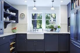 Blue kitchen island mixed with wooden countertops is very classic. Beautiful Blue Kitchen Cabinet Ideas