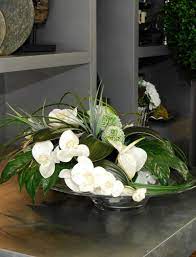 Check spelling or type a new query. Orchids And Allium On A Glass Platter Artificial Silk Flowers Fresh Flowers Arrangements Flower Arrangements Modern Flower Arrangements