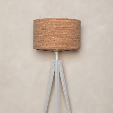 Floor lamps are a great way to bring additional lighting to a room. Tripod Floor Lamp Floor Light With Cork Shade Motta Living