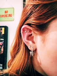 9 Gorgeous Ear Piercing Combinations To Try Now Ear Piercing Combinations Ear Piercings Blue Crystal Earrings