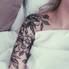 Really Like The Idea Of This I Want A Half Sleeve Of Flowers But Not Roses A More Even Ration Of Flowers And Tattoos Shoulder Cap Tattoo Half Sleeve Tattoo