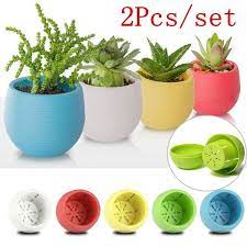 This shape looks fantastic, and different sizes are available for flowers, plants or small ornamental trees. 2pcs Small Cute Round Home Garden Office Decor Planter Plastic Plant Flower Pots Random Color Wish Flower Pots Plastic Flower Pots Flower Pot Garden