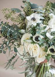 Flower Arrangement With Anemones Seeded Eucalyptus Feather Eucalyptus Gunni Eucalypt Wedding Flower Guide Wedding Flower Arrangements White Wedding Bouquets