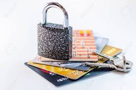 We don't need to take cash with us anywhere; A Blocked Bank Card Credit Card Account Is Blocked It Is Not Possible To Make Transactions On The Card Credit Cards In The Chain And Under Lock And Key Stock Photo Picture