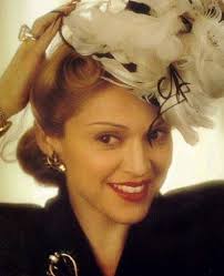 Is Madonna prettier with brown eyes?