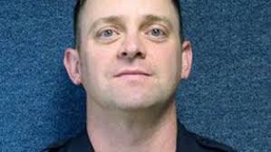 4 charged in kidnapping, gang slaying of Va. officer