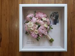 Its a decorative accessory for the image of a girl. Preserved Wedding Bouquet In Contemporary White Shadow Box With Wedding Photo And Engraving Wedding Bouquet Preservation Bouquet Shadow Box Wedding Shadow Box