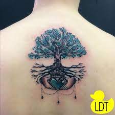 Are you someone who is bold and loud? Claddagh And Celtic Tree Of Life Tattoo Tattoo Ideas And Inspiration Claddagh Tattoo Tree Of Life Tattoo Irish Tattoos