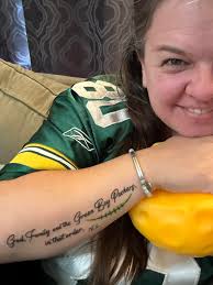 Guys I need help. I want to get a packers tattoo sleave. What images should  I incorporate.