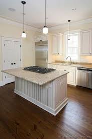 One small with a sink, the other large with a built in stove and breakfast bar. Magnificent Kitchen Island Ideas With Stove White Kitchen Remodeling Kitchen Island With Cooktop Kitchen Remodel Small