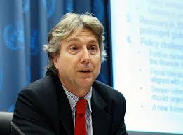 Director for Development and Policy Analysis Addresses Press Conference