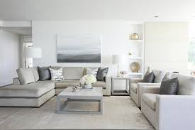 Ornamental solid wood finial feet. Light Taupe Sofa With Steel Gray Pillows Transitional Living Room