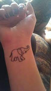 Cute Cartoon Elephant With Its Trunk Up Adorable Elephant Tattoos Up Tattoos Tattoos
