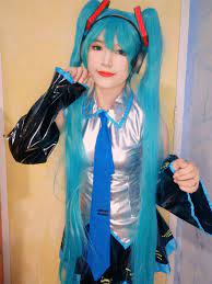 Hatsune Miku cosplay costume wig, Women's Fashion, Dresses & Sets, Sets or  Coordinates on Carousell