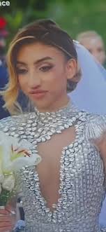 That dress is horrendous and so is she 🤮