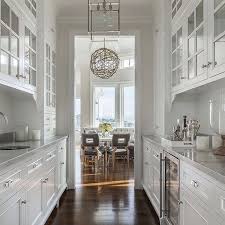 A Traditional Butler S Pantry Is Tucked Behind The Main Kitchen Of This Glamorous California Home By Annlo Kitchen Remodel Small Kitchen Remodel Butler Pantry