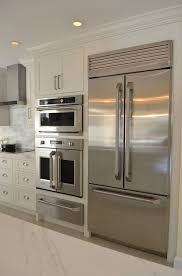 White Kitchen With Driftwood Peninsula Koby Kepert Kitchen Appliances Layout Kitchen Designs Layout Kitchen Layout