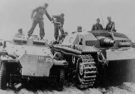 A German Sturmgeshutz Being Refueled By A Halftrack Crew War Tank German Tanks German Army