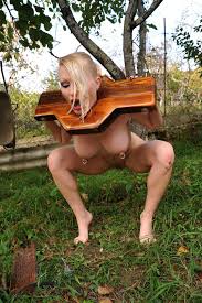 Blonde chick Jenny Simpson having some fun with her pierced nipples -  Pichunter