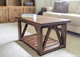 I made this simple and inexpensive coffee table using 2x4 and plywood. Diy Coffee Table With Truss Sides