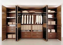 These cabinets have a glossy finish made out of wood that comes in a combination of brown and white. Wardrobe Design Ideas For Your Bedroom 46 Images