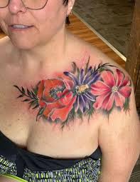 A marigold, daisy, a daffodil and a...