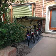 Fahrrad Related Posts Fahrrad Helmhalter Diy Diy Fahrrad Und Rollerstander 4 Fahrrad Pod Bewahren Si In 2020 Fahrradabstellraum Fahrradkeller Aufbewahrung Garten
