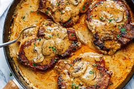 Garlic Pork Chops Recipe In Creamy Mushroom Sauce How To Cook Pork Chops Eatwell101