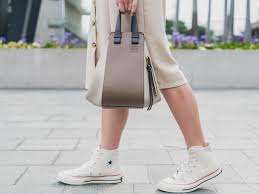 Take a closer look at the zipper and its chain, leather quality and handle shapes, stitching. Anatomy Of A Loewe Hammock Tote For Weekends Infinite Blog By Style Theory