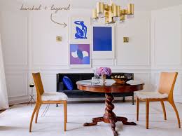 If you love hanging photos but don't love the idea of spending a fortune on frames, there are many cute and easy ways you can hang your photos, or any pieces of art a unique alternative for larger photos is to use skirt or pants hangers that you have lying around. In The Details Unique Ways To Hang Art Coco Kelley Coco Kelley