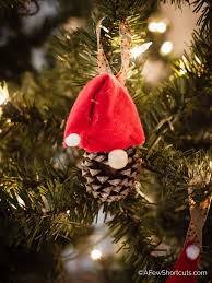My kids and i just learned how to make a sock gnome over thanksgiving break by watching this fantastic youtube video by creartive by nature at this cool channel here on. Diy Pinecone Gnome Christmas Ornaments A Few Shortcuts