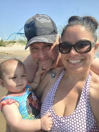 Could anyone please take off the shadow from my son. I love this picture  and it is so hard for me to take one where all of us are looking at the