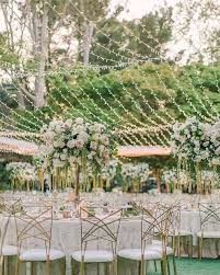 Dining Under A Sea Of Lights And Weeping Centerpieces For This Garden Glam Wedding Creative Team Wedding Decor Inspiration Glam Wedding Wedding Decorations