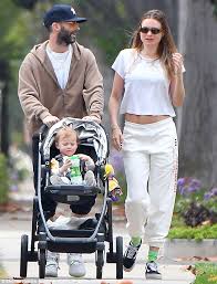 We've got two kids, he added. Behati Prinsloo Plants A Sweet Kiss On Daughter Dusty Rose In La Daily Mail Online