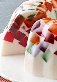 Creamy Jell O Mosaic Dessert Cubes Of Rainbow Hued Gelatin Give This Cool And Refreshing Dessert Its Mosaic Styl Refreshing Desserts Gelatin Recipes Desserts