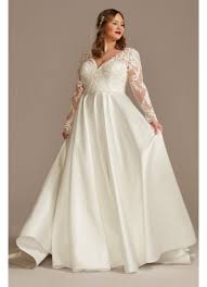 Both wore traditional gowns with elegant lace sleeves. Long Sleeve Satin Plus Size Applique Wedding Dress David S Bridal