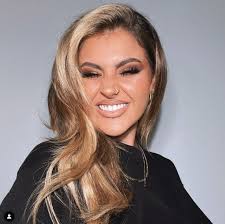 This styles will make you feel like you're part of the babysitter's club. Jamie Genevieve Stuns Fans With Dramatic New 80s Prom Haircut
