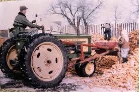 Back in the fifties when the corn crib got full, the farmers in our  neighbor built outside storage using snow fence.