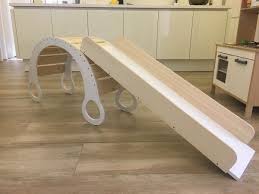 Regenbogenwippe Und Kinderrutsche Heimwerker Helden De Kinderrutsche Kinder Rutsche Schaukelwippe