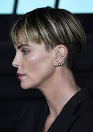 Charlize theron is proof of a woman can shave her hair and look more exquisite than ever. Charlize Theron Photostream Short Hair Styles Charlize Theron Short Hair Short Wavy Hair