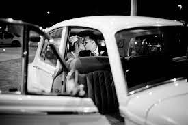 Bride And Groom Kiss In Antique Car New Orleans Wedding Classic Car Rental Wedding Classic