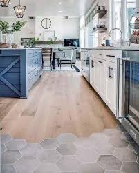 Natural stone tiles for your kitchen floor is a very classic choice and give a real sense of grandeur and stature to your space. Top 50 Best Kitchen Floor Tile Ideas Flooring Designs Modern Kitchen Flooring Modern Kitchen Tile Floor Kitchen Floor Tile