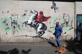 His use of stenciling developed from a need to complete a work quickly, namely to avoid being caught vandalizing by police. Street Artist Banksy Splashes Paris With Works On Migrants Chicago Sun Times